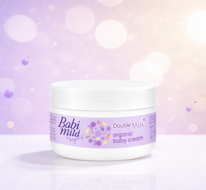 Jar of Double Milk organic baby cream on a light purple background   Babi Mild & Beyond Double Milk Protein Organic Baby Cream
